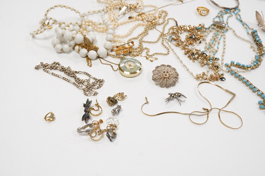 A 9ct and cabochon black onyx set pendant, on a 9ct chain, a 9ct and gem set ring and pair of 9ct and cultured pearl set ear clips, together with other items including costume jewellery, a silver bangle and a silver book